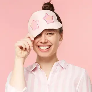 Woman wearing sleep mask